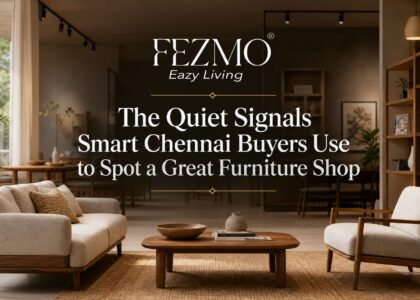 Customer evaluating furniture quality in a Chennai showroom by checking sofa materials, craftsmanship, warranty details, and display condition before making a purchase.